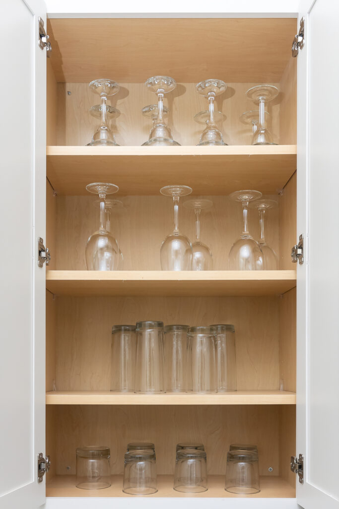 Glassware in fully stocked kitchen in an Airbnb 